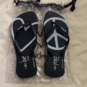 Black Flip Flops with Peace Sign Design